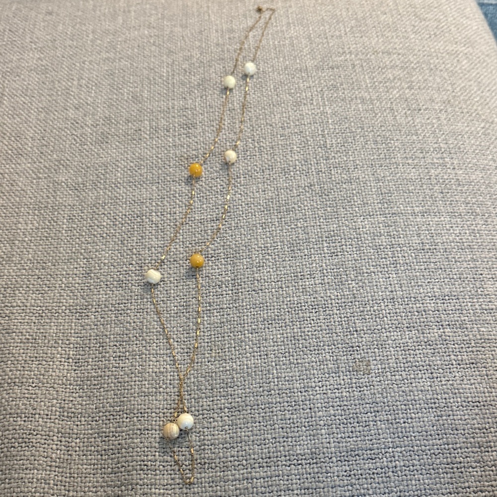 Elegant Gold and White Beaded Necklace